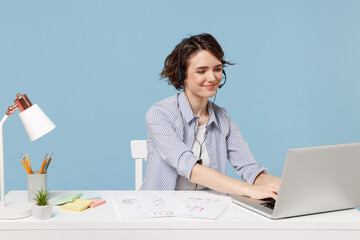 Young operator employee business woman in shirt set microphone headset helpline assistance sit work...