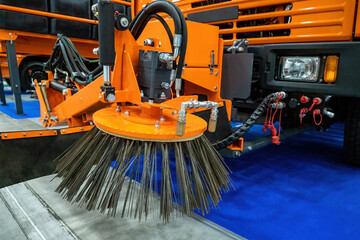 Special equipment for street cleaning. Sweeping brush - cleaning machine close-up. Fragment of a...