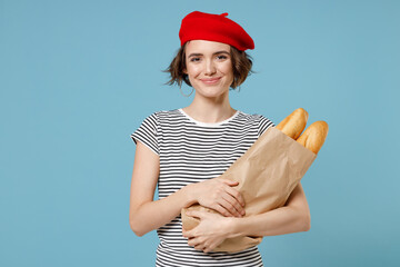 Young fun smiling european woman 20s with short hairdo wears french beret red hat striped tshirt...