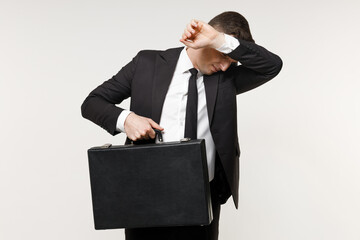 Young frustrated successful employee business corporate lawyer man 20s in classic black suit shirt...