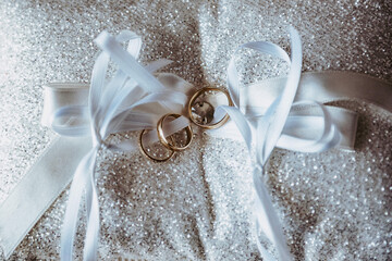 wedding rings on a silk