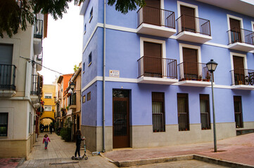 Fototapeta premium Facade of houses of different living colors typical in Spain.