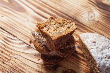 Fototapeta na wymiar Sliced fresh rye bread on a wooden table