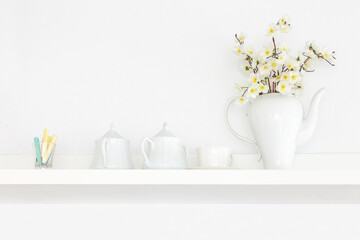 Fototapeta na wymiar Classic style of Cup, Teapot and Vase decorate on wall