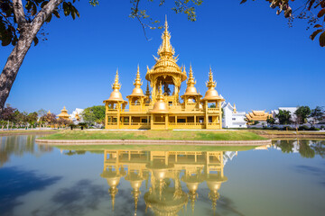 Gold pagoda in Wat Rong Khun or White Temple, Thailand.