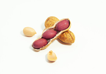 Roasted peanuts in shell on white background