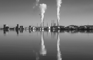 Reflection on water of a factory
