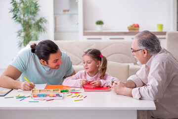 Three generations of family in early development concept