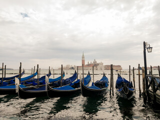 Fototapeta premium Blue gondolas in Venice