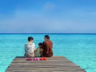 Family travel at sea together.Family is relaxing together at the sea. Beautiful sea.