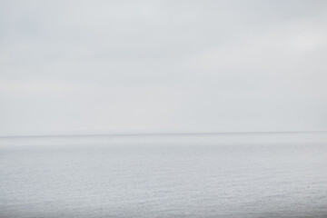 Sea in cloudy weather, background, texture. Early spring
