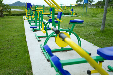 Public exercise equipment installed for the general public in a greenfield public nearby reservoir 