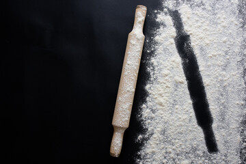 Baking background with copy space on black surface for your text. Top view.