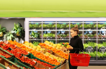 Woman buying fruits at the market