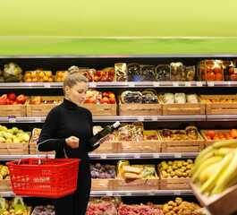 Woman buying fruits at the market