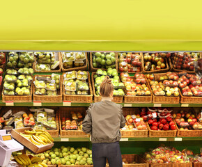 Woman buying fruits at the market