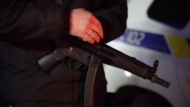Policeman with a machine gun