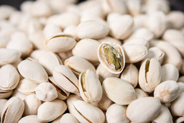 pistachios texture and background . tasty pistachios as background,as pistachios texture. flat lay. (selective focus; close-up shot).