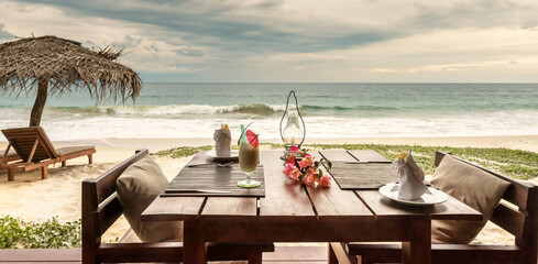 Romantic dinner in tropical beach restaurant or cafe, Sri Lanka