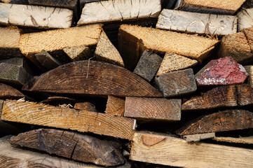 wood trimming stacked for storage, countryside.