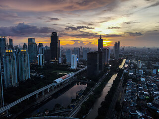 Fototapeta na wymiar aerial view of Sunset in the skyscrapers of Jakarta. Jakarta, Indonesia, April 4, 2021