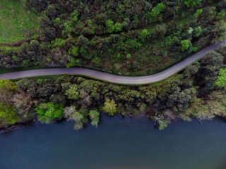 Aerial view of the Nalon river and a road in Candamo, Asturias Spain