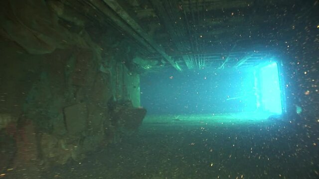 Ship wreck Salem Express underwater in the Red Sea in Egypt. Extreme tourism on ocean floor in world of coral reefs, fish, sharks. Researchers of wildlife blue abyss. Deep diving.