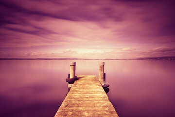 Fototapeta premium Lake Zug in Switzerland. Wooden pier.