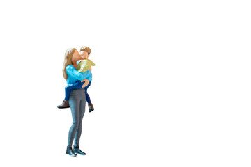 Miniature people mother holding her cute baby son in the arms