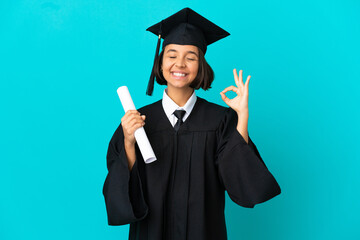 Young university graduate girl over isolated blue background in zen pose