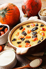 Pumpkin casserole with dried fruits - 425334811