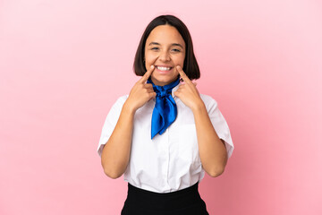 Airplane stewardess over isolated background smiling with a happy and pleasant expression