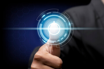 Fototapeta premium man touching screen, pushing on a touch screen power button.