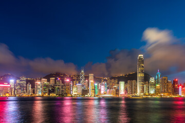 Fototapeta na wymiar Hong Kong downtown skyline across Victoria harbor at night, Hong Kong, China.
