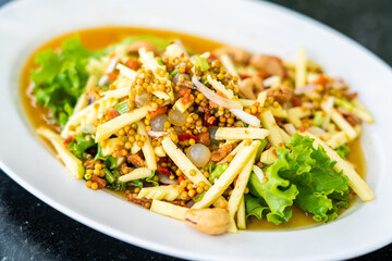 Thai spicy three eggs salad, popular thai seafood dish
