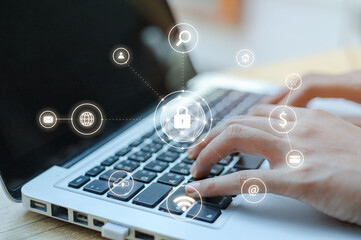 Business, technology, internet, and networking concept. businesswoman working on his laptop at home, select the icon security on the virtual screen. security The media