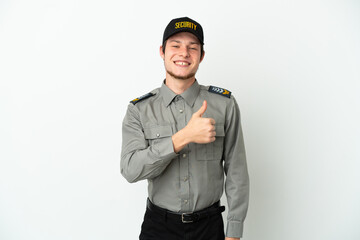 Young Russian security man isolated on white background giving a thumbs up gesture