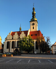 Fototapeta na wymiar Late Gothic Church in Czech republic named Kostel Proměnění Páně na hoře Tábor with Baroque dome from 15th and 16th century on Žižka Square. 
