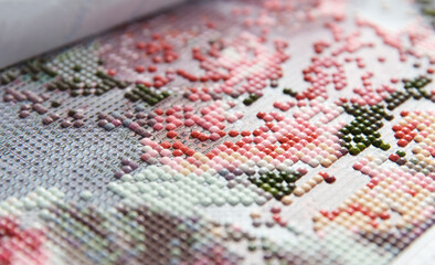 Handmade process of creation of diamond painting 3d from square rhinestones