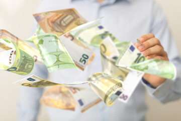 bill euro banknote in hand rain