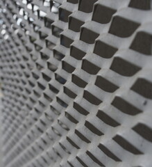 close-up on urban architecture, metal grid background