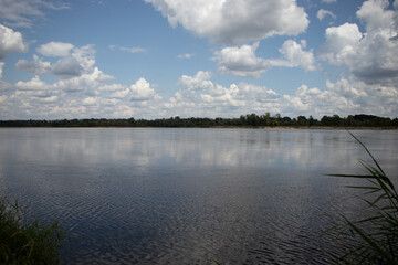 clouds reflected in water