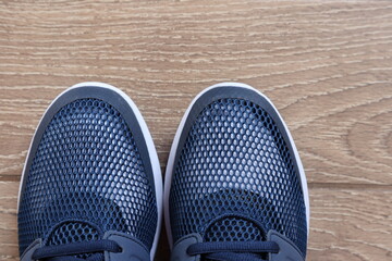Men's blue summer sneakers with white soles.