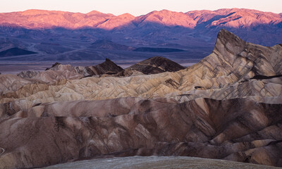 Magnificent badlands of Death Valley at sunrise