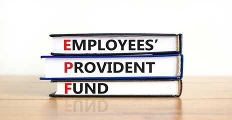 EPF, employees provident fund symbol. Books with words 'EPF, employees provident fund'. Beautiful...