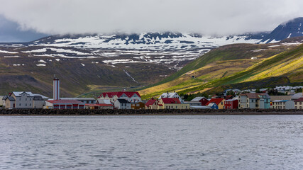 the town of Isafjordur in north west of Iceland viewed from the sea during summer season