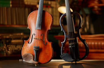 Violin in retro style and modern electric viola