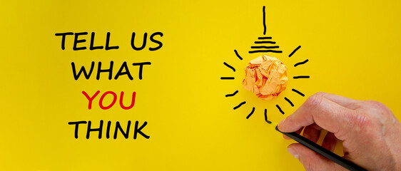 Support symbol. Businessman writing 'tell us what you think', isolated on beautiful yellow...