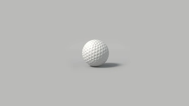 Side on view of a 3D golf ball rolling from left to right. Standard white golf ball in a continuous roll perfect for sports advertising. 4K clip at 30fps for smooth motion with an alpha matte.