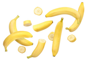 Whole bananas and slices are flying on a white background. Isolated